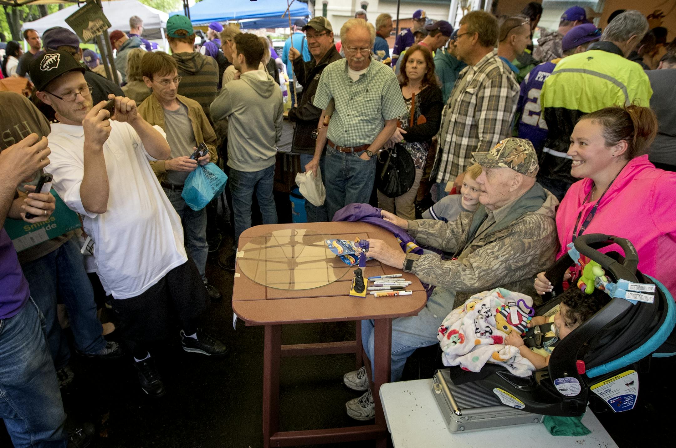 Bud Grant posed for a photo during his annual garage sale. The former Minnesota Vikings head coach turns 90 years old on May 20.