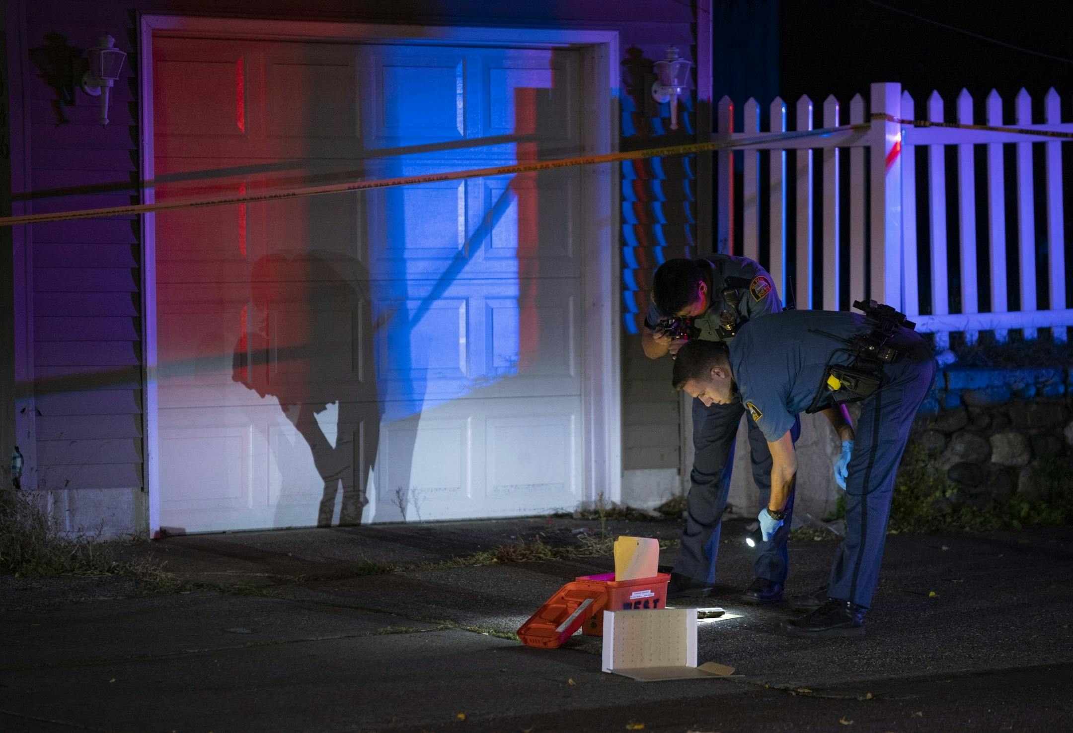 A St. Paul Police officer photographed a handgun on the sidewalk on Pascal St. as they investigated the scene of a double shooting in St. Paul Sunday night.