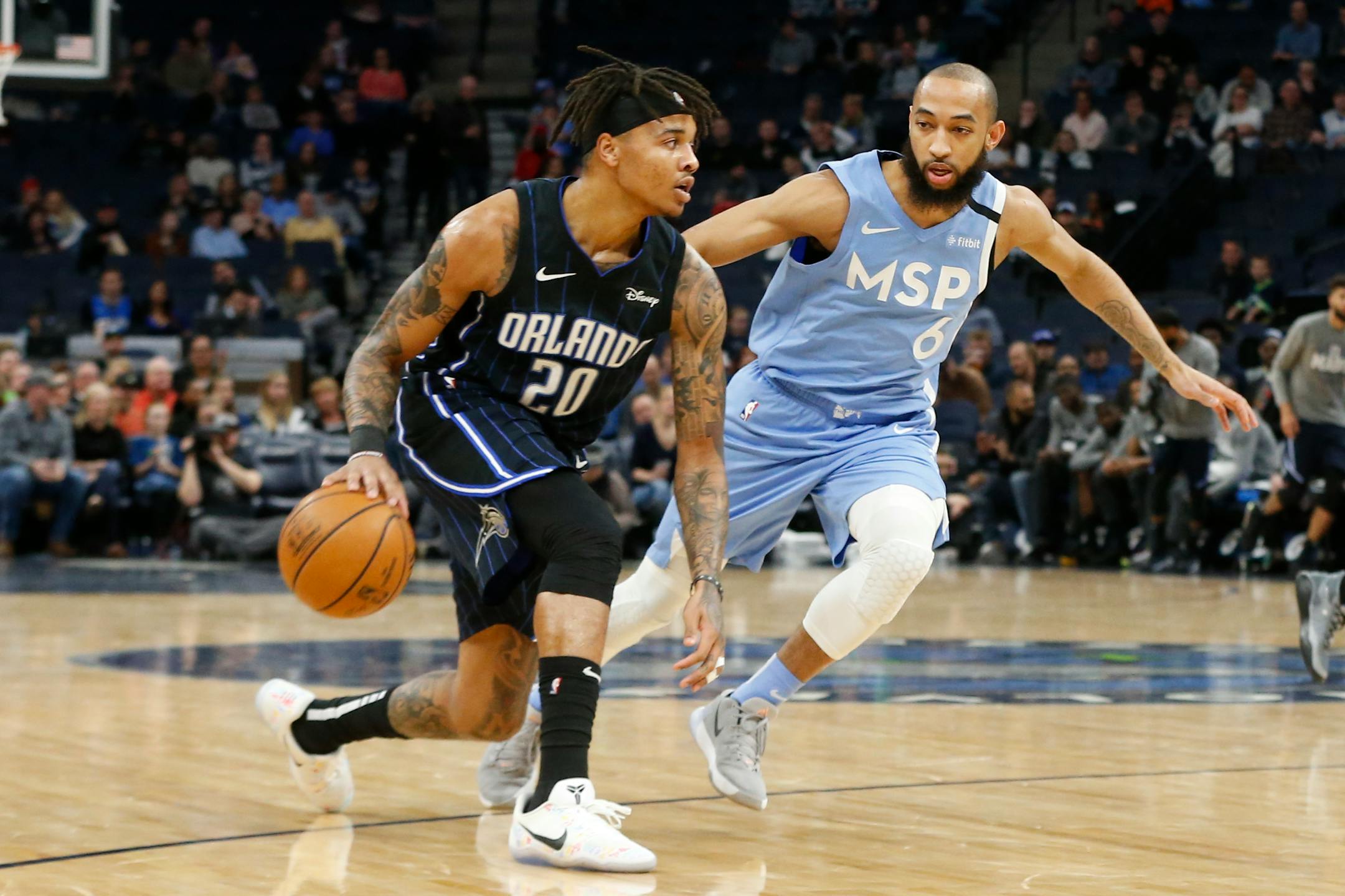 Orlando's Markelle Fultz drives against the Timberwolves' Jordan McLaughlin in the first half