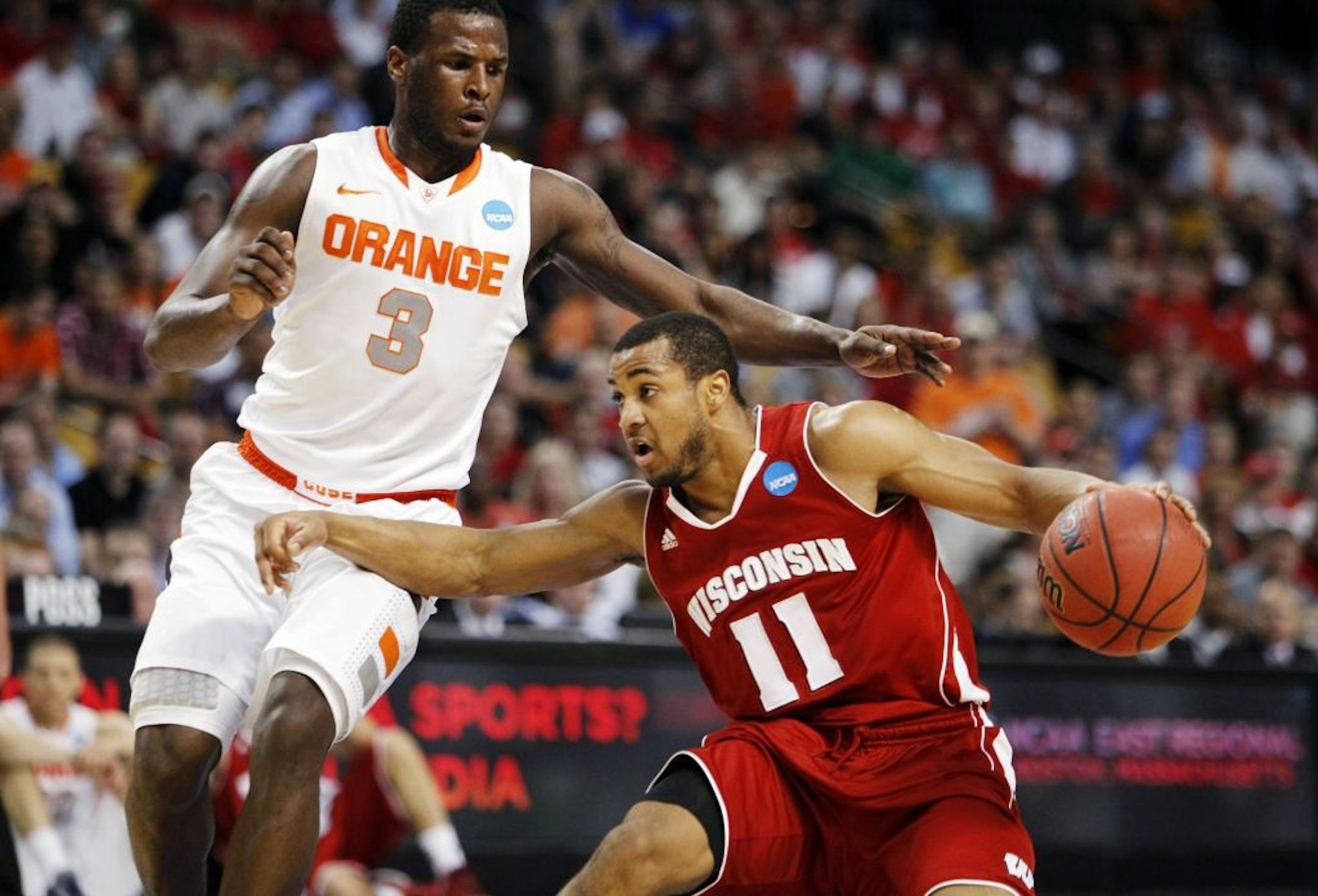 In the final game of his college career, Wisconsin's Jordan Taylor — going against Syracuse's Dion Walters — had 17 points and six assists, but his potential game-winning three failed to hit its mark.