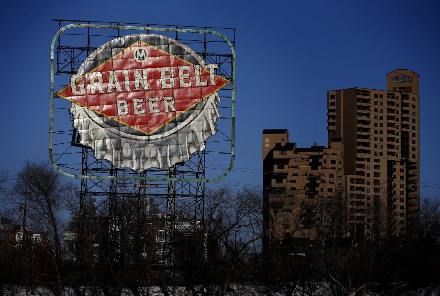 Grain Belt sign Minneapolis, Minnesota. ] CARLOS GONZALEZ cgonzalez@startribune.com, January 15, 2015, Minneapolis, Minn., Recent movement on the old-neon-sign front is welcome news to lovers of old signs, from North Star Blanket to Grain Belt and Schmidt Brewery. Story updates status of signs (Schmidt Beer is re-lit in St. Paul; North Star Blanket is slated for restoration; Pillsbury A Mill is down but there are hopes for its revival; Grain Belt on Nicollet Island is not lit but is slated for r