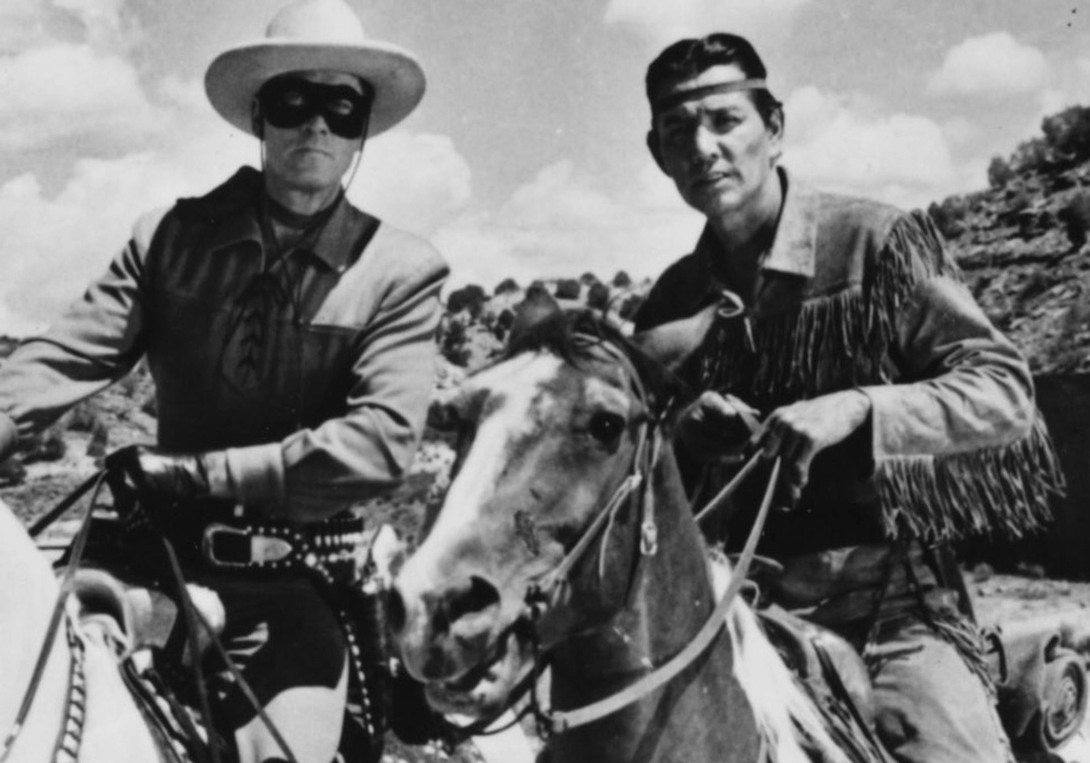 (Left to right) Clayton Moore stars as the Lone Ranger, and Jay Silverheels as his trusted Indian partner Tonto, in the television series "The Lone Ranger." File photo.