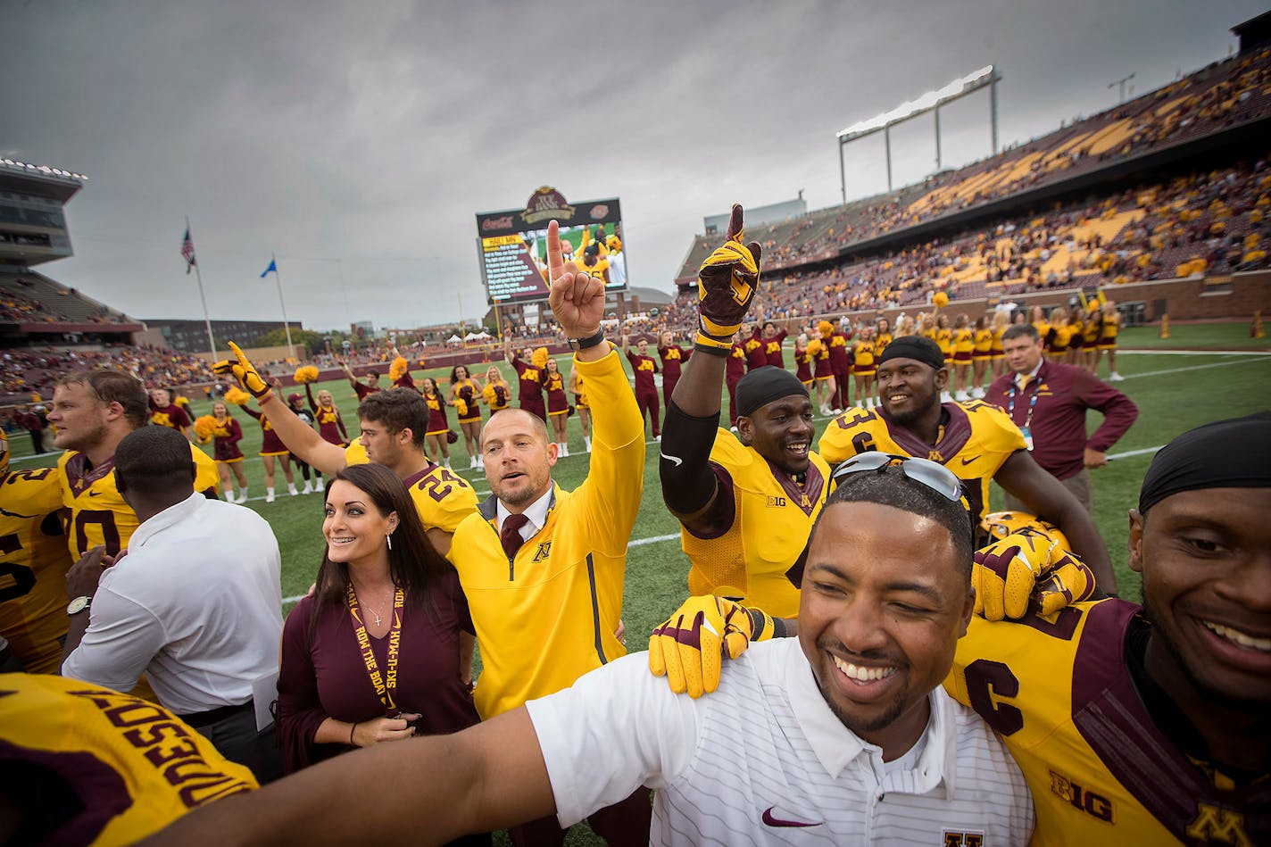 Minnesota Head Coach P.J. Fleck and Heather Fleck celebrated with the team on the field after the Gophers defeated Middle Tennessee at TCF Bank Stadium, Saturday, September 16, 2017 in Minneapolis, MN.