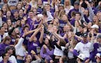 The St. Thomas student section reached out for a free T-shirt during the Sept. 25 home opener against Butler.