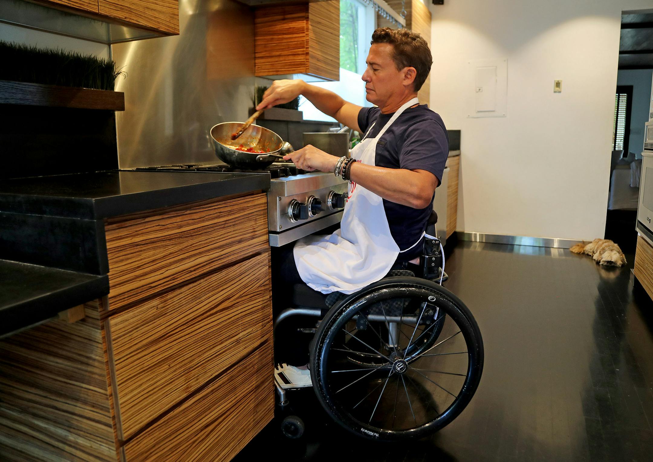 Master Chef Latino John Pardo of Miami prepares a pasta dish in his home kitchen in Coconut Grove. (Susan Stocker/South Florida Sun Sentinel/TNS) ORG XMIT: 1396524 ORG XMIT: MIN1908200337260398