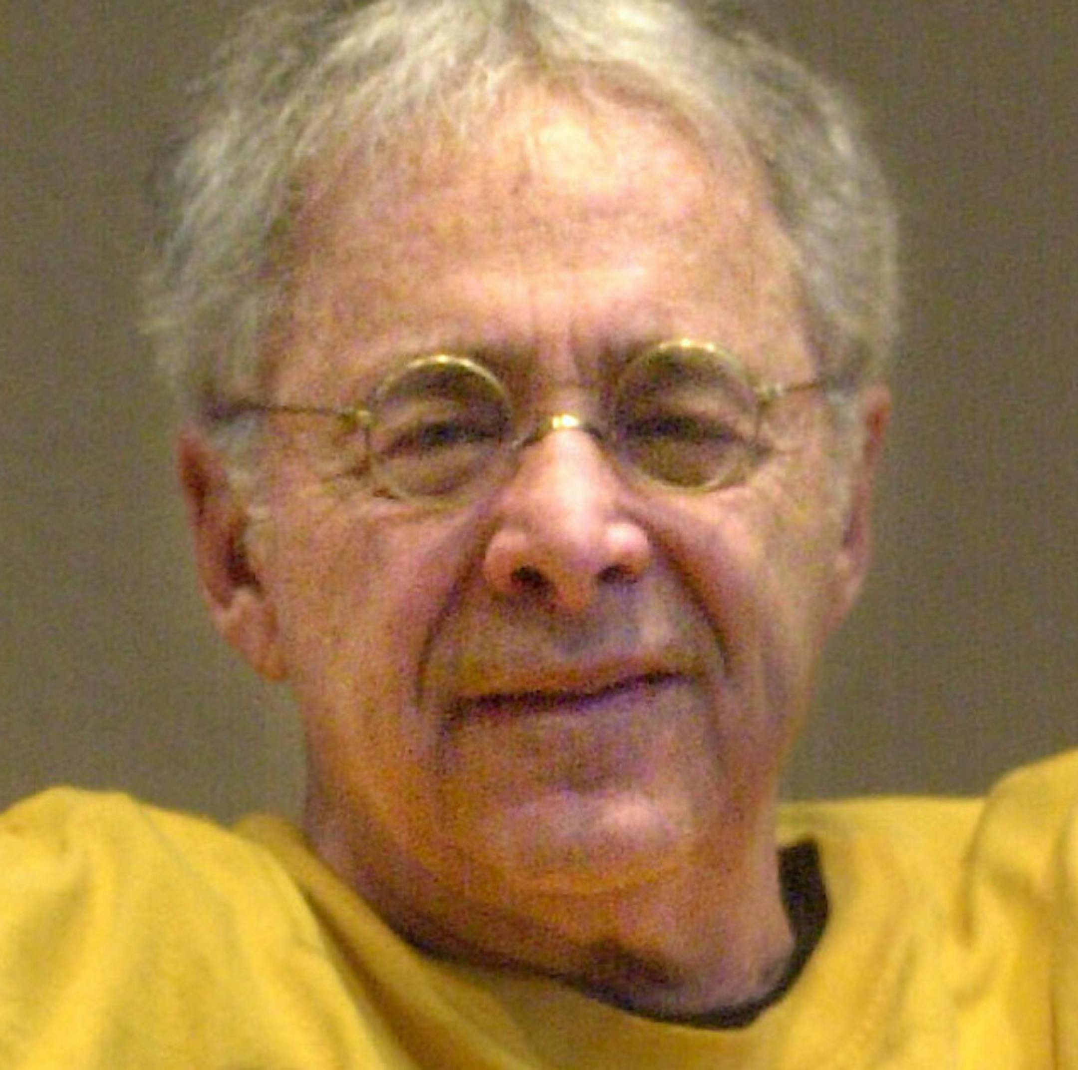 FILE - In this Dec. 20, 2002 file photo, Chuck Barris, the man behind TV's "The Dating Game," poses in the lobby of his apartment in New York. Game show impresario Barris has died at 87. Barris, the madcap producer of "The Gong Show" and "The Dating Game," died of natural causes Tuesday afternoon, March 21, 2017, at his home in Palisades, New York. (AP Photo/Bebeto Matthews, File)