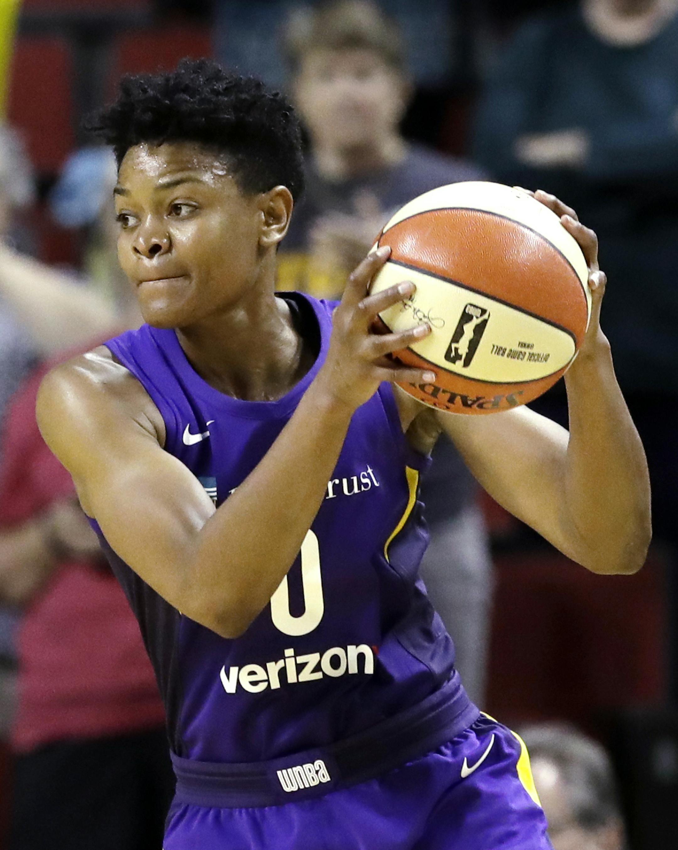 Los Angeles Sparks' Alana Beard in action against the Seattle Storm in the second half of a WNBA basketball game Tuesday, July 10, 2018, in Seattle. (AP Photo/Elaine Thompson) ORG XMIT: MIN2018082019304248