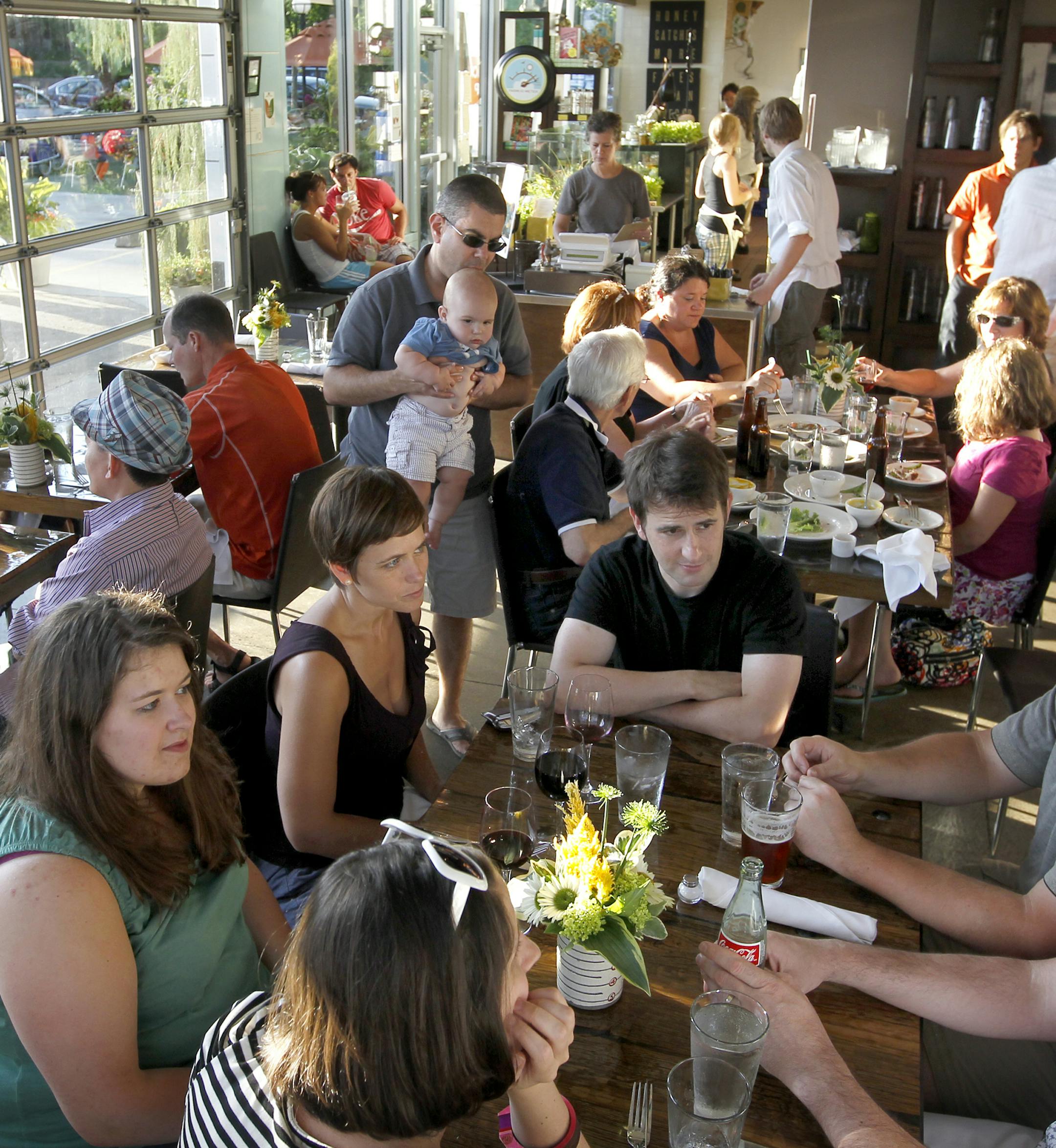 A full dining room at the Wise Acre Eatery, 5401 Nicollet Ave South, Mpls, MN] TOM WALLACE ‚Ä¢ twallace@startribune.com __Assignments #20018935A_ July 14, 2011_ SLUG: rn0728_ EXTRA INFORMATION: The Wise Acre Eatery restaurant, 5401 Nicollet Ave South, Mpls, MN, has been open for a couple months. People: A portrait of Chef, (CQ) Beth Fisher, and a portrait of Fisher and GM (CQ)Caroline Glawe. Food: Fried chicken, "Shades of Summer" salad, and the custard sundae of the day. _Names