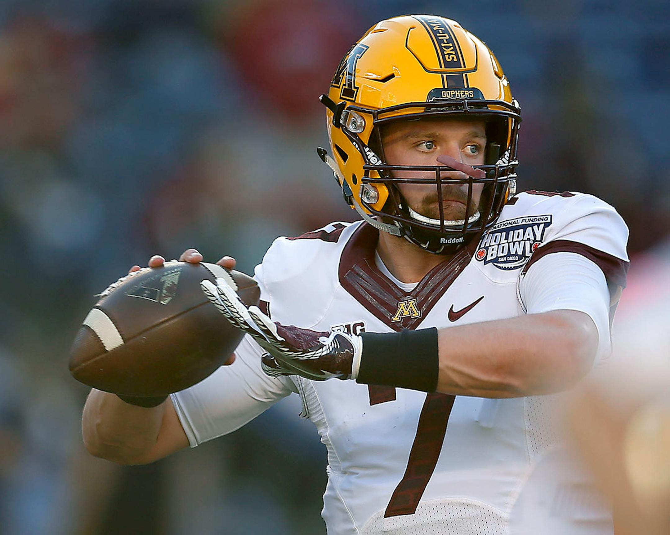 Minnesota's quarterback Mitch Leidner warmed up with the team before taking on Washington State at Qualcomm Stadium for the San Diego Holiday Bowl, Tuesday, December 27, 2016 in San Diego, CA.