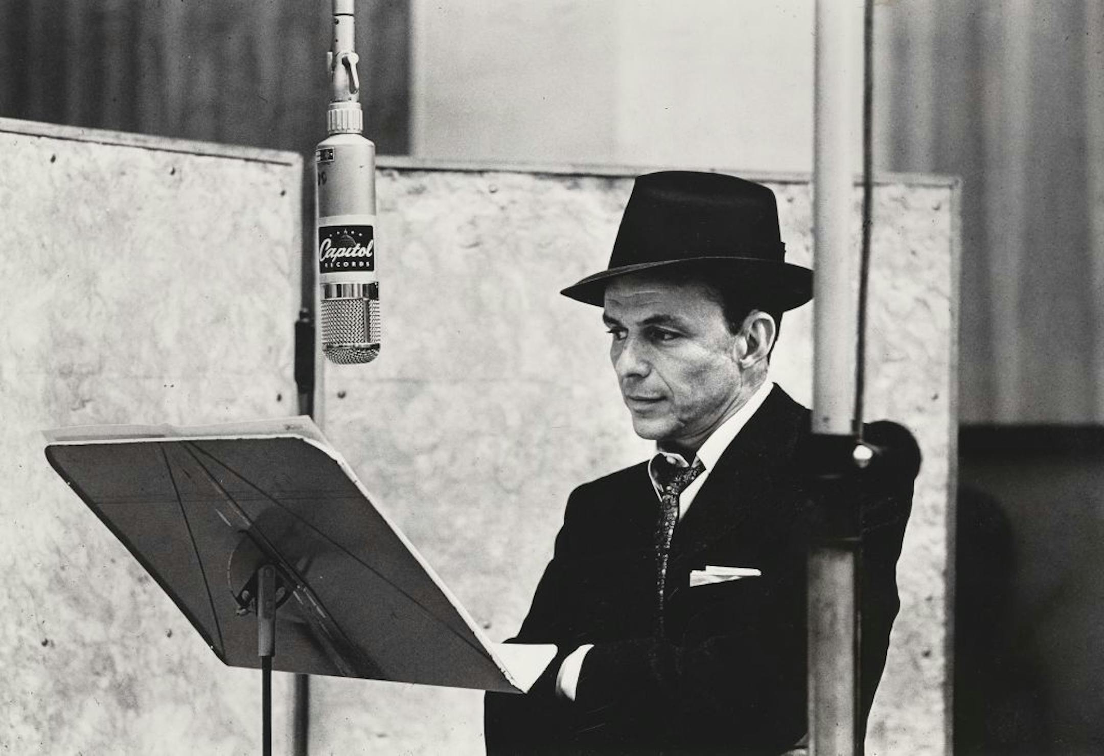 This handout photo provided by the National Portrait Gallery, taken in 1956, shows Frank Sinatra, by Herman Leonard.