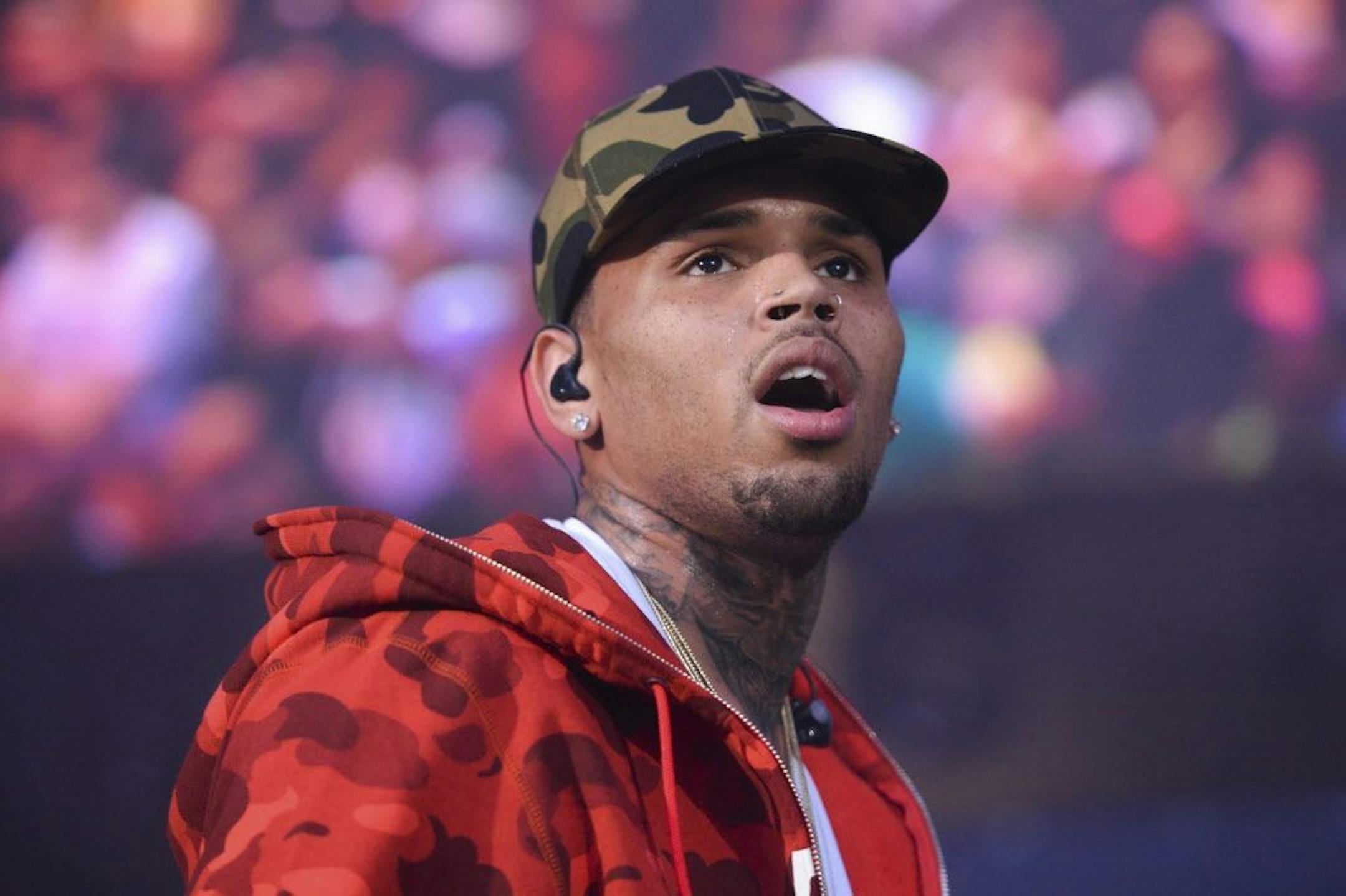 FILE - In this June 7, 2015, file photo, rapper Chris Brown performs at the 2015 Hot 97 Summer Jam at MetLife Stadium in East Rutherford, N.J. Brown and Soulja Boy announced Jan. 4, 2017, that they've signed on for a three-round boxing match that will be televised on pay-per-view and promoted by Floyd Mayweather.