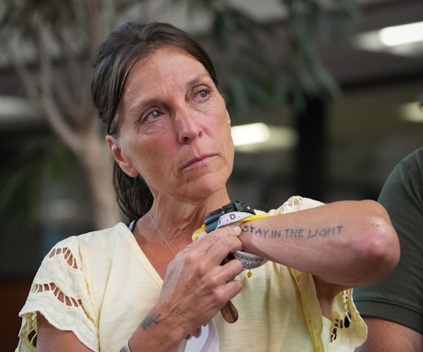 Jay Boughton’s wife, Kristin Boughton, pointed out a tattoo on her arm that reads “Stay in the light,” which has become their family’s creed.