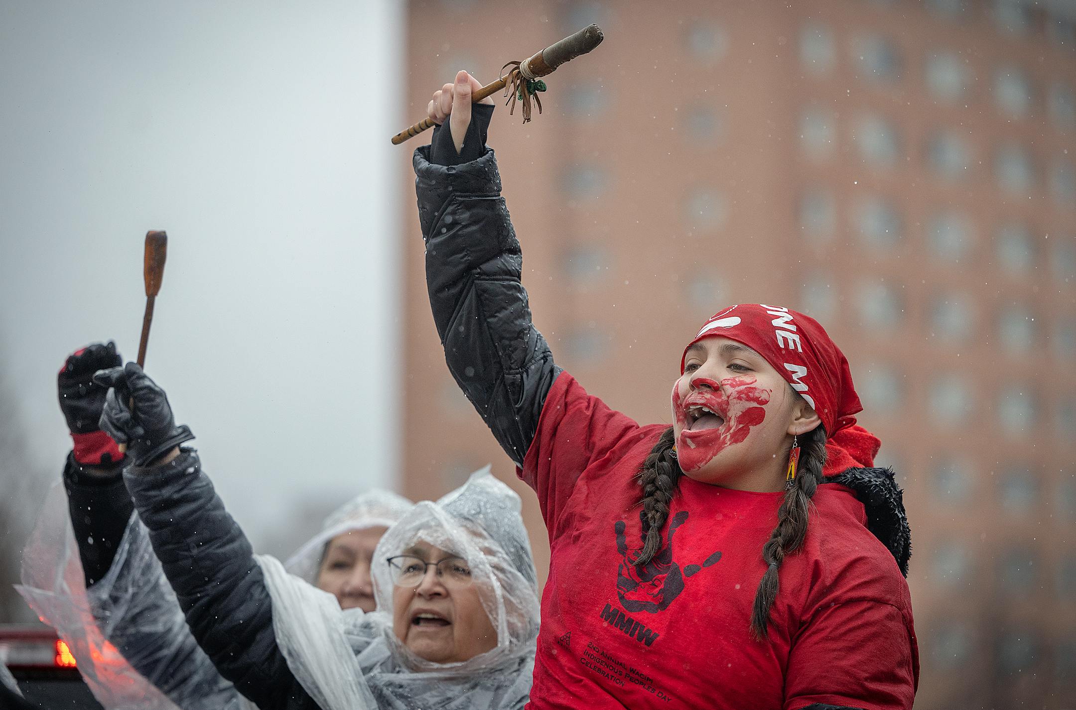 Jennifer Cortes, 18, cq, sings and drums as she joined hundreds during the annual Missing and Murdered Indigenous Women's rally and march at the East Phillips Park Cultural & Community Center, in Minneapolis, Minn., on Tuesday, Feb. 14, 2023.  Minnesota's movement to solve the cases of hundreds of missing and murdered Indigenous women and girls hit a milestone last year with the opening of a first-in-the-nation office tasked with systemically trying to fix the problem. Minnesota's Native women legislators reflected on where the movement goes from here during the annual Missing and Murdered Indigenous Women's march in Minneapolis.   ] Elizabeth Flores • liz.flores@startribune.com