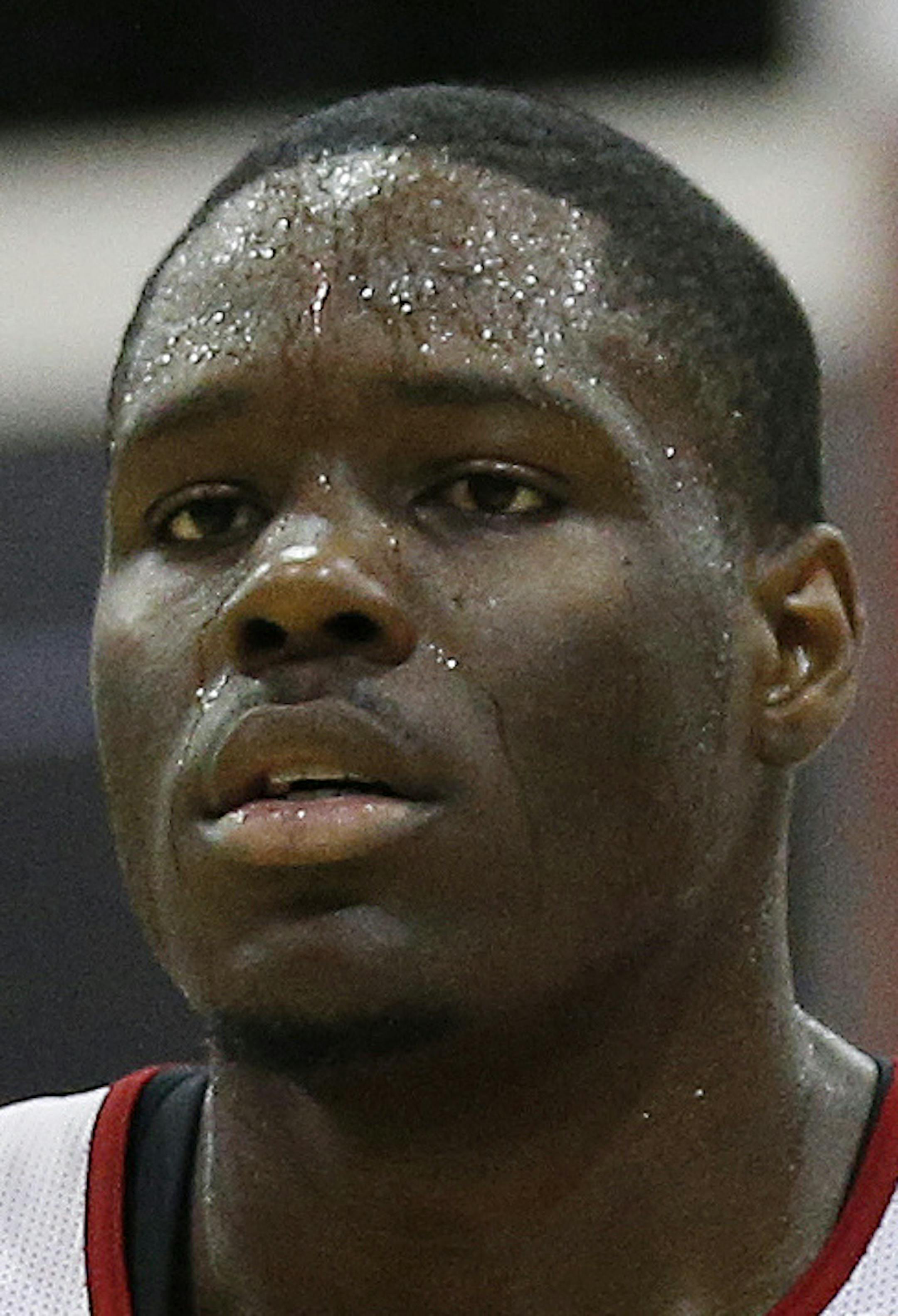Cleveland Cavaliers' Anthony Bennett reacts after a play against the Milwaukee Bucks in an NBA summer league basketball game Friday, July 11, 2014, in Las Vegas. (AP Photo/John Locher) ORG XMIT: MIN2014082315242036