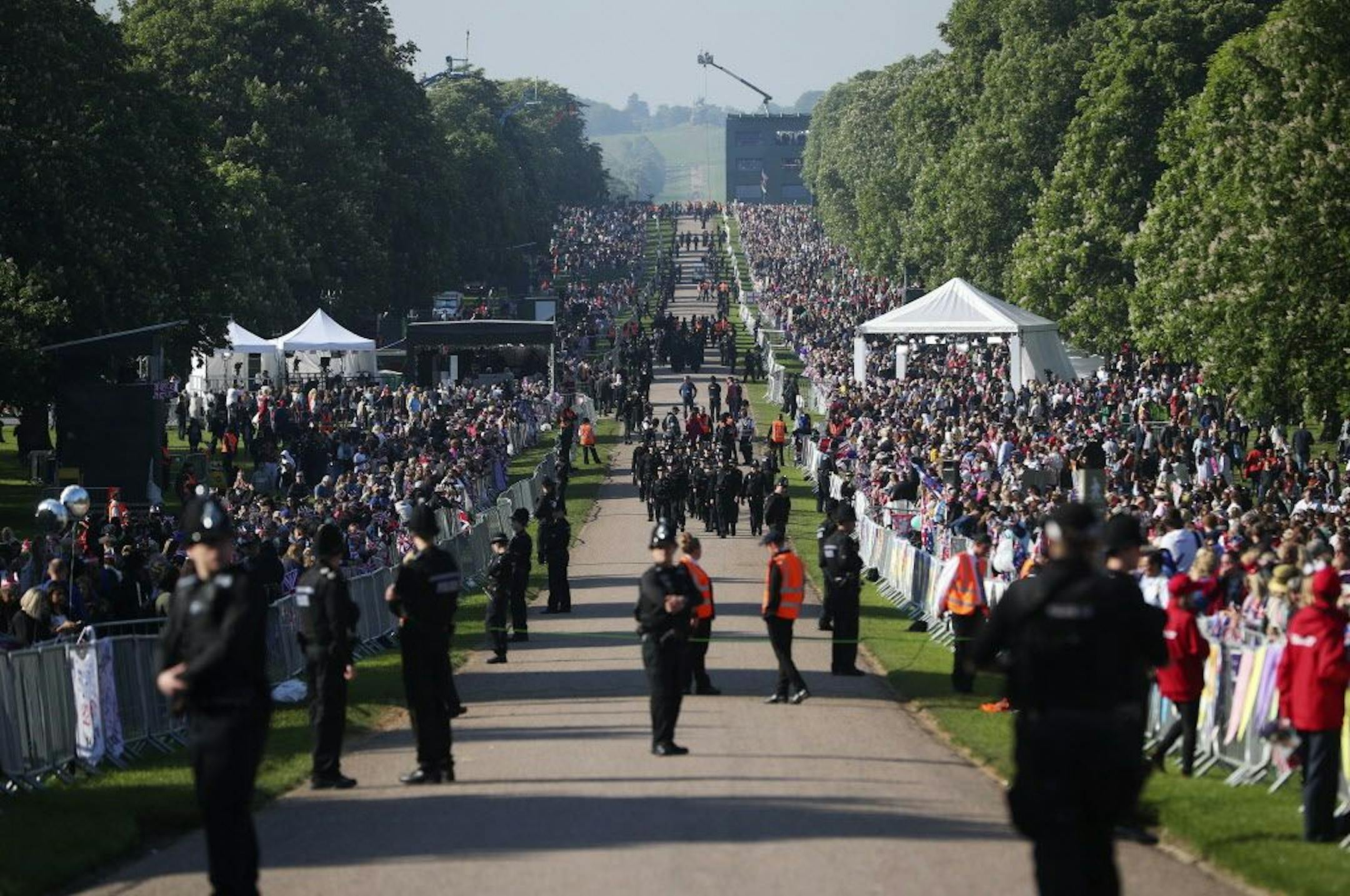 Royal fans gather on the Long Walk outside Windsor Castle ahead of the wedding ceremony of Prince Harry and Meghan Markle at St. George's Chapel in Windsor Castle in Windsor, near London, England, Saturday, May 19, 2018.