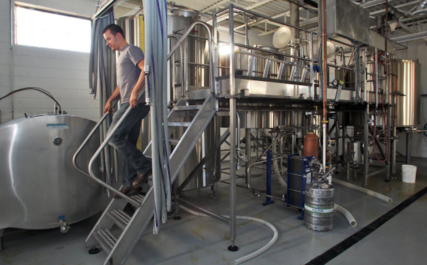 Brian Hoffman, co-founder of Fulton Brewery in Minneapolis, in the brewery's main mechanical brewing area. (MARLIN LEVISON/STARTRIBUNE(mlevison@startribune.com (cq Brian Hoffman)