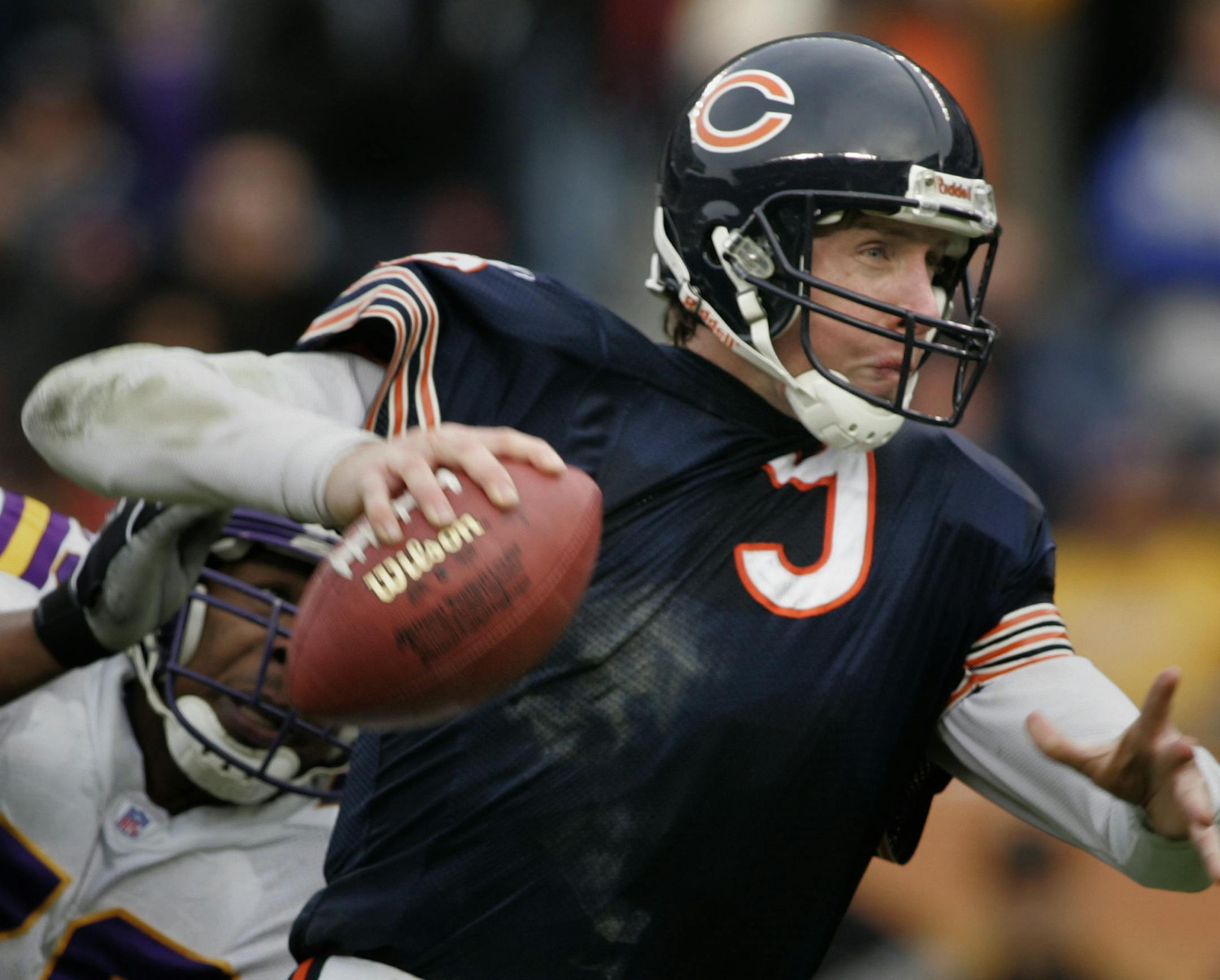 Jim Gehrz/Minneapolis Star Tribune Minnestoa Vikings' Kenny Mixon pulls Chicago quarterback Chad Hutchinson down for a sack in the third quarter in NFL action Sunday, December 5, 2004, at Soldier Field in Chicago, Illinois. THe Bears won the game 24-14.