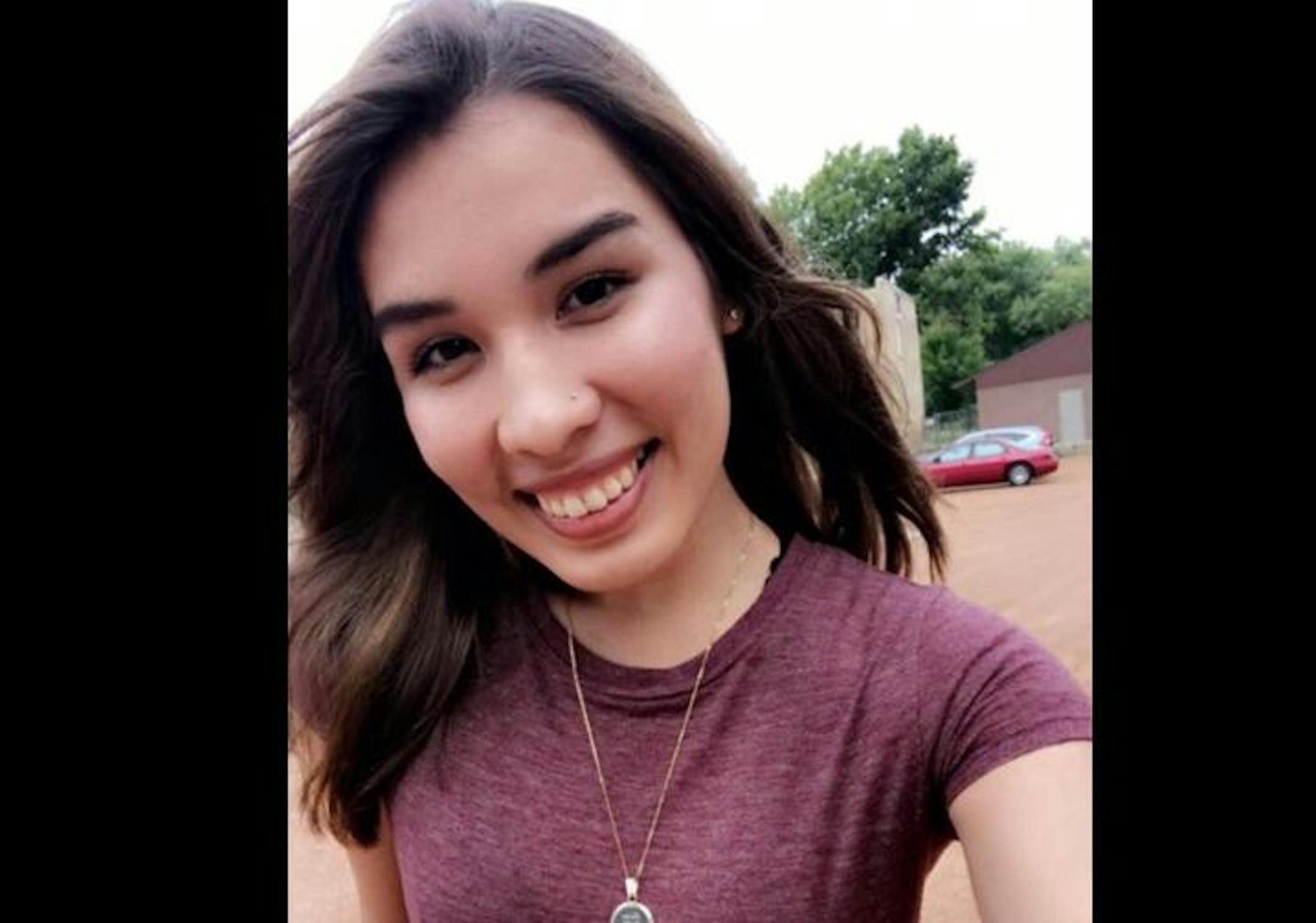 This is Betty Perez, standing in the parking lot where she later would be ambushed, taken into a swamp and raped.