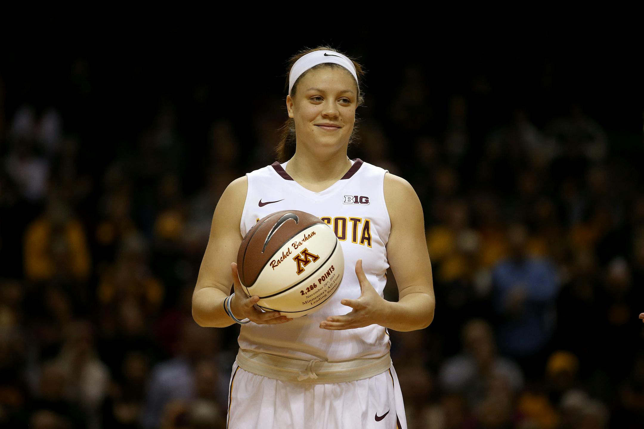 Rachel Banham was honored as the al- time leading scorer before a game in December.