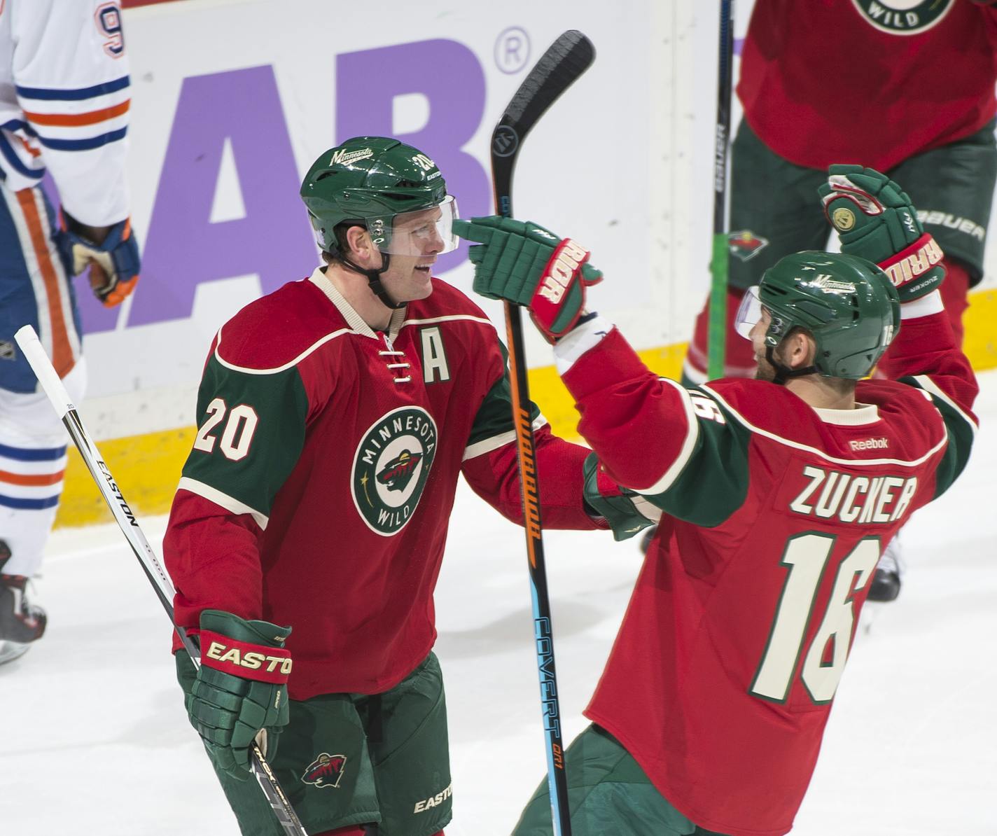 Minnesota Wild defenseman Ryan Suter (20) and left wing Jason Zucker (16) celebrated a goal by Suter in the first period against Edmonton. ] (AARON LAVINSKY/STAR TRIBUNE) aaron.lavinsky@startribune.com The Minnesota Wild played the Edmonton Oilers on Tuesday, Oct. 27, 2015 at Xcel Energy Center in St. Paul, Minn. ORG XMIT: MIN1510271956294689