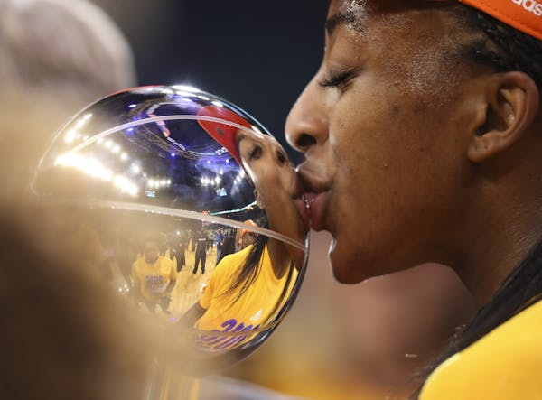 Los Angeles Sparks forward Nneka Ogwumike (30) kissed the WNBA Championship after the Sparks' win.