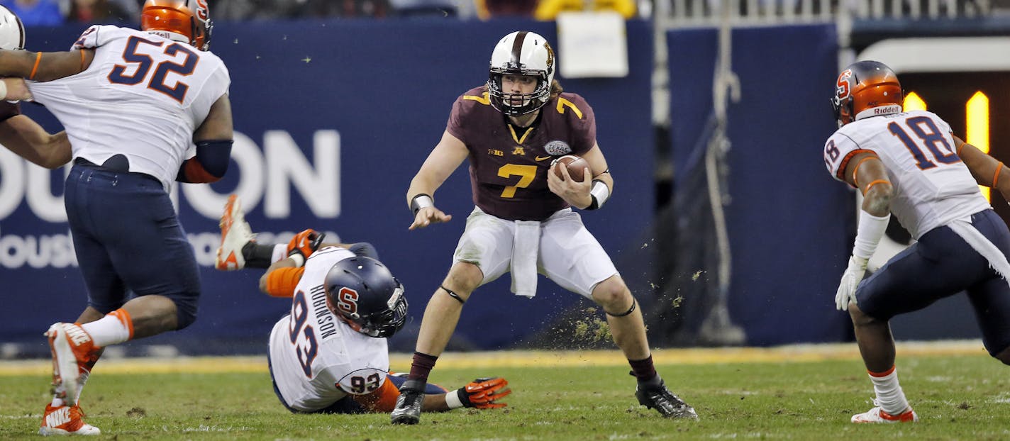 Minnesota Gophers vs. Syracuse Orange in Texas Bowl. Mitch Leidner (7) came in for starting quarterback Philip Nelson but didn'r find much running room in first half action. (MARLIN LEVISON/STARTRIBUNE(mlevison@startribune.com)