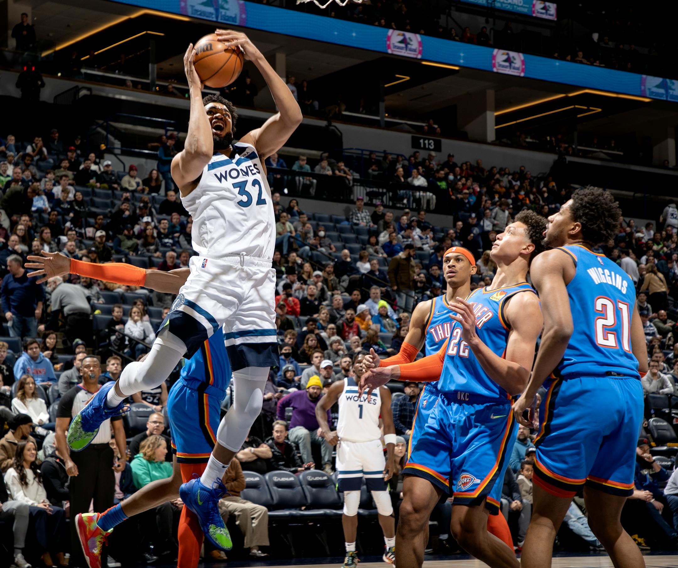 Karl Anthony-Towns (32) of the Minnesota Timberwolves attempts a shot in the first quarter.