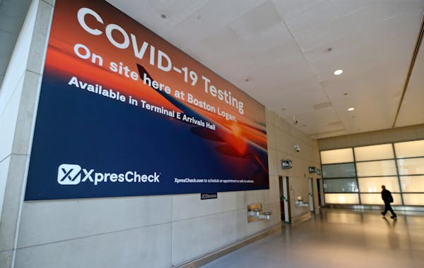 COVID-19 testing at Terminal E at Logan International Airport on June 6, 2022, in Boston. 