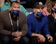 Minnesota Timberwolves co-owners Alex Rodriguez, left, and Marc Lore watched the Wolves play New Orleans at Target Center last month.