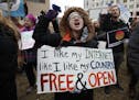 Lindsay Chestnut of Baltimore protested near the Federal Communications Commission in Washington on Thursday ahead of the vote on net neutrality.