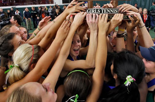 Girls Class 2A state tennis tournament finals. Edina players celebrated with their first place team trophy at the end of the tournament. . (MARLIN LEVISON/STARTRIBUNE(mlevison@startribune.com)