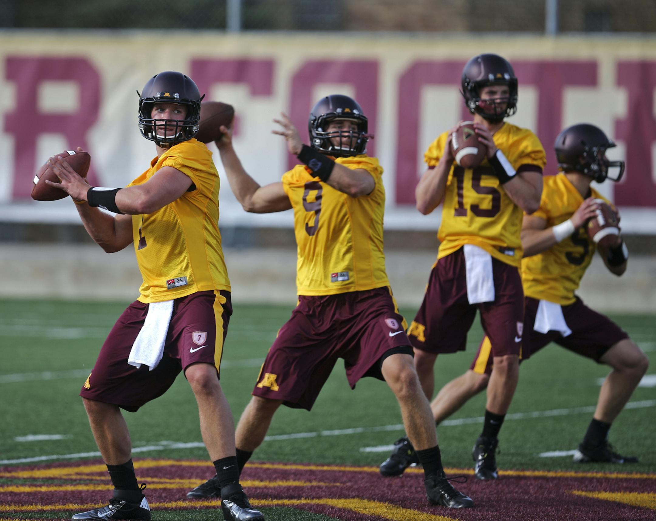 Philip Nelson (9) played seven games at quarterback for the Gophers last season and got the edge in experience while Mitch Leidner, left, took a redshirt year. As the team opened fall practice Friday at the Gibson-Nagurski Complex, both quarterbacks expressed a desire to start, yet a willingness to share the spot.