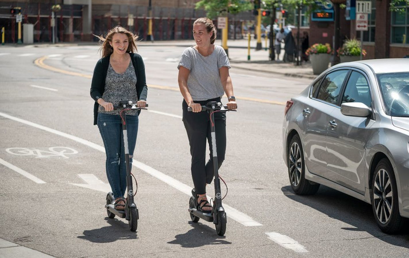 Sophie Konewko and Megan Albers decided to take two Bird scooters for a ride through downtown Minneapolis after lunch.