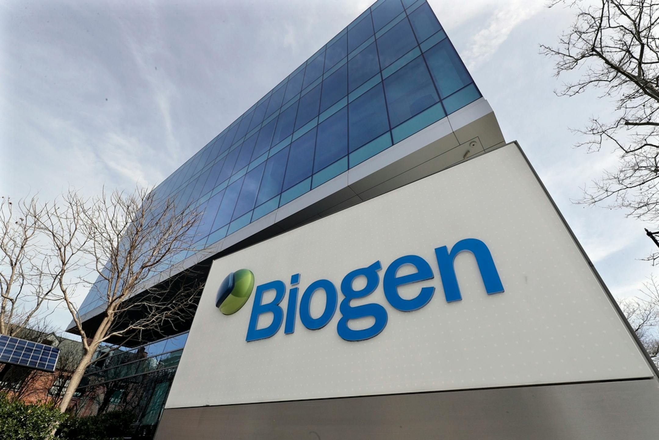The Biogen Inc., headquarters, Wednesday, March 11, 2020, in Cambridge, Mass. A new Alzheimer's drug from Biogen brought in only $300,000 in sales during its first full quarter on the market, continuing a slow debut complicated by coverage questions and concerns from doctors. The infused drug, hailed as a potential breakthrough treatment for a fatal disease, has encountered a health care system that "remains a major bottleneck" in keeping the treatment from patients, CEO Michel Vounatsos said Wednesday, Oct. 20, 2021. (AP Photo/Steven Senne)