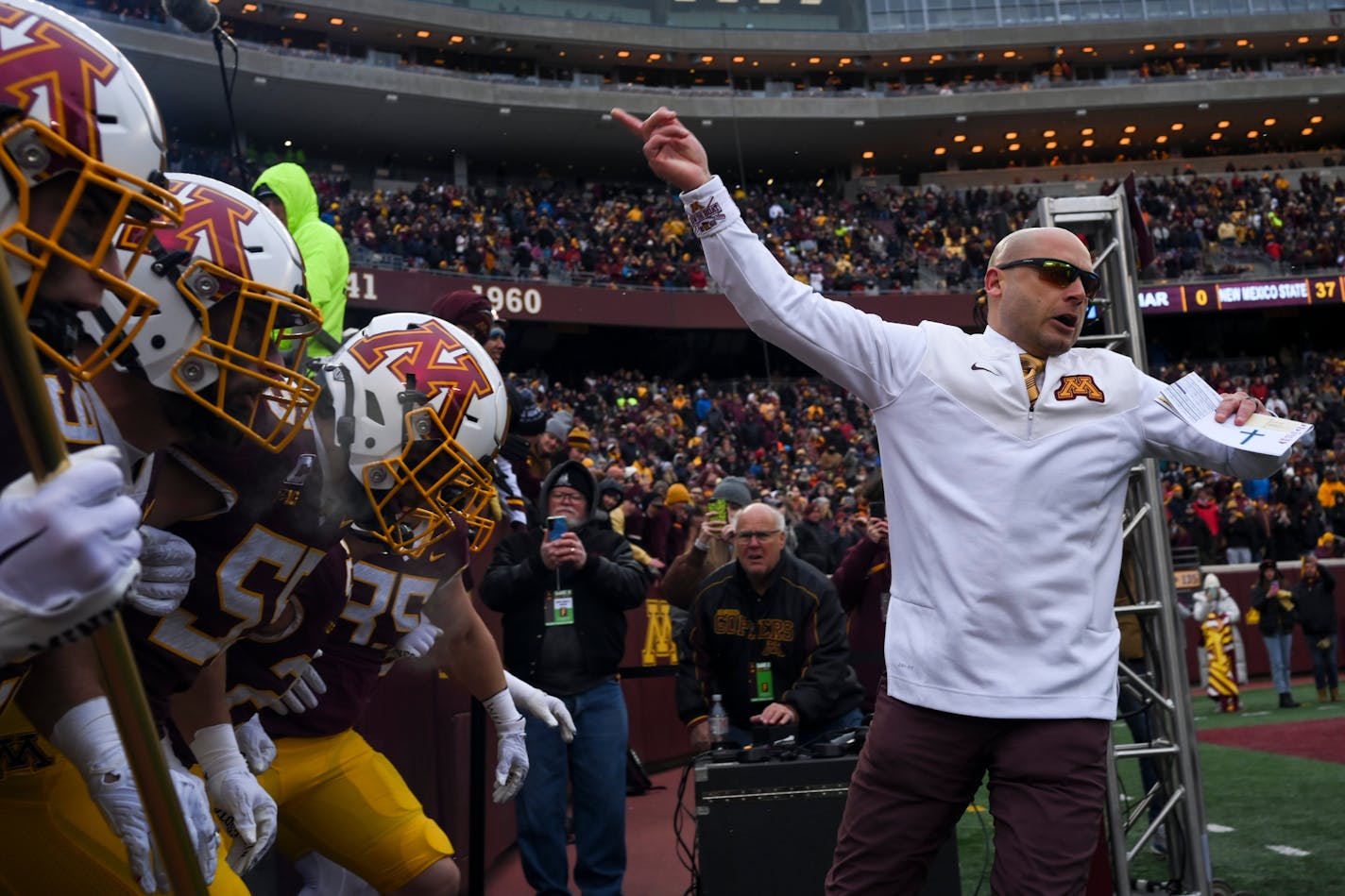 Minnesota Gophers head coach P.J. Fleck leads the team onto the field before the start of an NCAA football game against the Northwestern Wildcats Saturday, Nov. 12, 2022 at Huntington Bank Stadium in Minneapolis, Minn.. ] AARON LAVINSKY • aaron.lavinsky@startribune.com