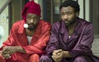 This image released by FX shows Lakeith Stanfield, left, and Donald Glover in a scene from the comedy series "Atlanta." Glover was nominated Thursday 