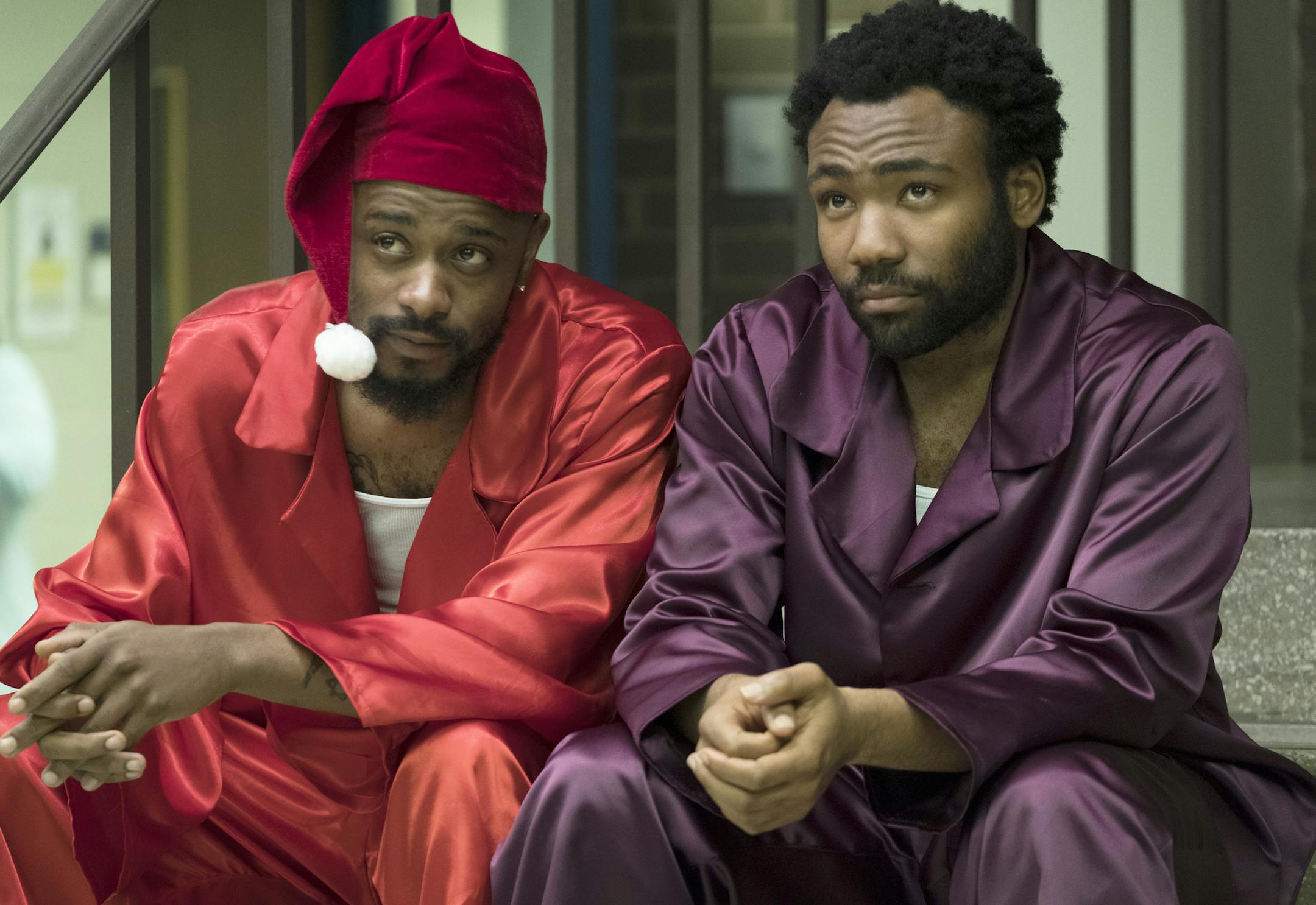 This image released by FX shows Lakeith Stanfield, left, and Donald Glover in a scene from the comedy series "Atlanta." Glover was nominated Thursday for an Emmy for outstanding lead actor in a comedy series. The 70th Emmy Awards will be held on Monday, Sept. 17. (Guy D'Alema/FX via AP)