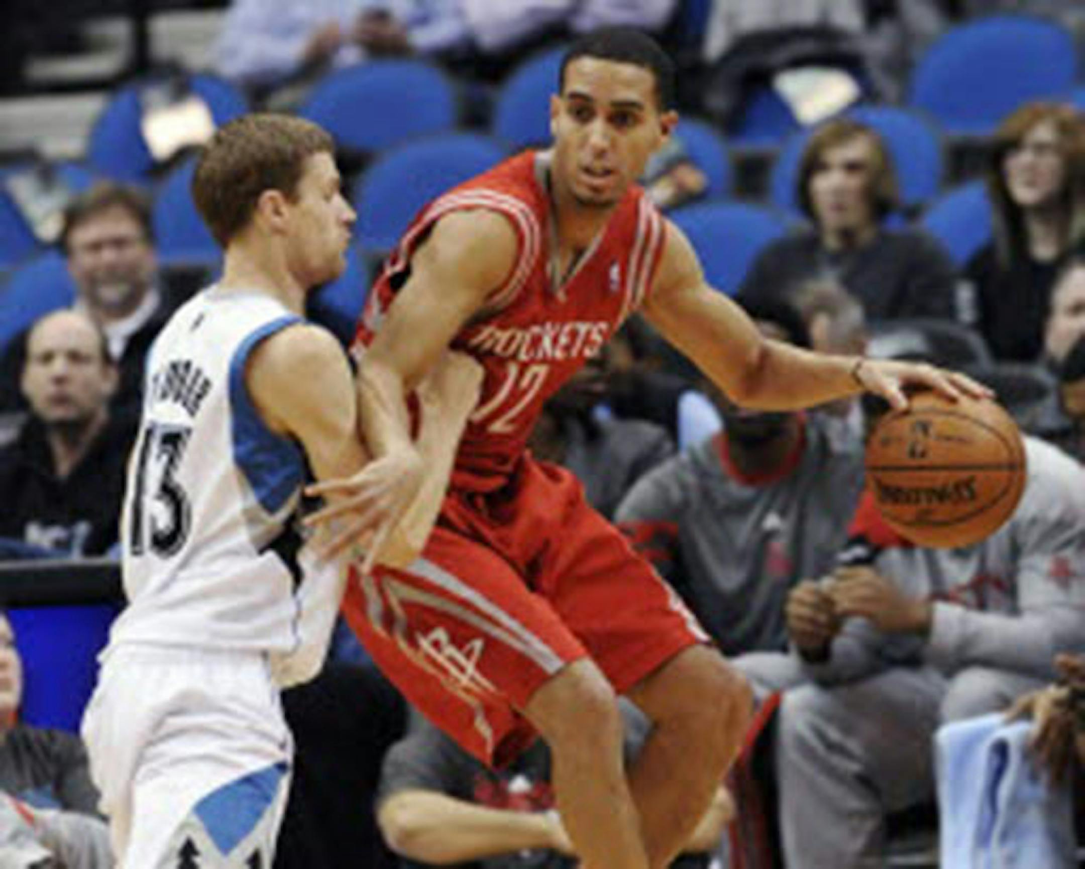 Shooting guard Kevin Martin (dribbling against the Timberwolves' Luke Ridnour) agreed to a four-year, almost $28 million contract with the Wolves on Tuesday.