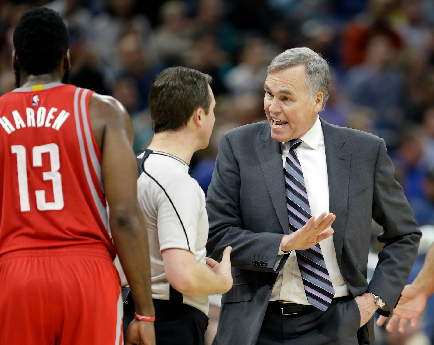 Houston Rockets head coach Mike D'Antoni, right, has words with referee Scott Twardoski , claiming James Harden (13) was fouled while shooting against the Orlando Magic in the second half of an NBA basketball game, Friday, Jan. 6, 2017, in Orlando, Fla.