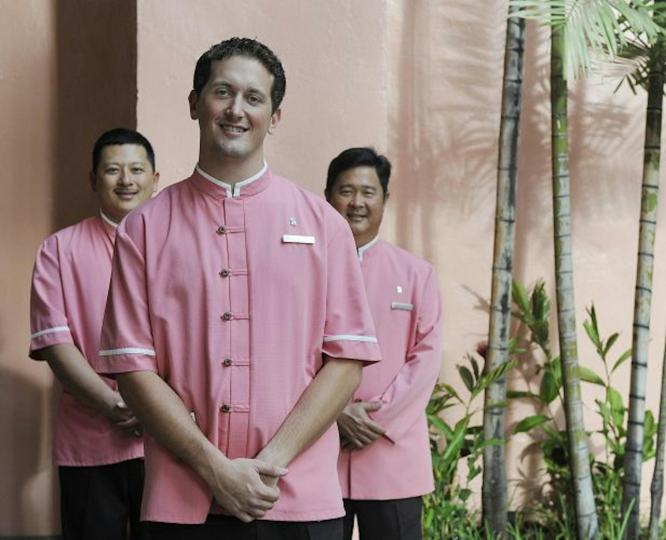 From left, doormen Gary Gushiken, Evan Brunken and Daniel Nomera are at your service with an easy smile at the Royal Hawaiian, "Pink Palace of the Pacific" in Waikiki on Oahu Island, Hawaii.
