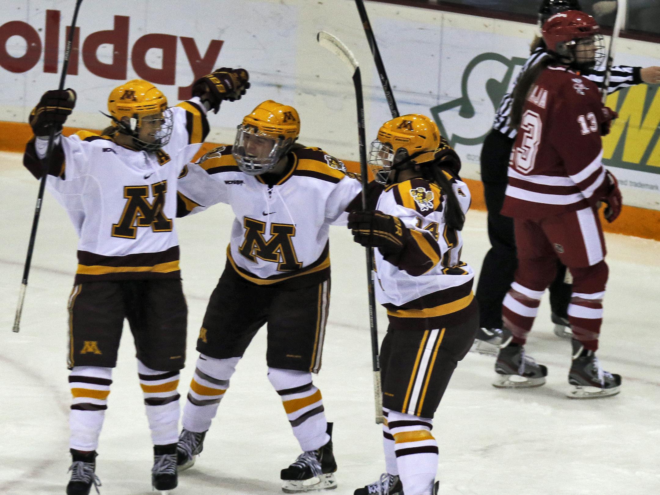 Minnesota Gophers womens hockey game vs. Wisconsin. Gophers celebrated a first period goal. . (MARLIN LEVISON/STARTRIBUNE(mlevison@startribune.com)