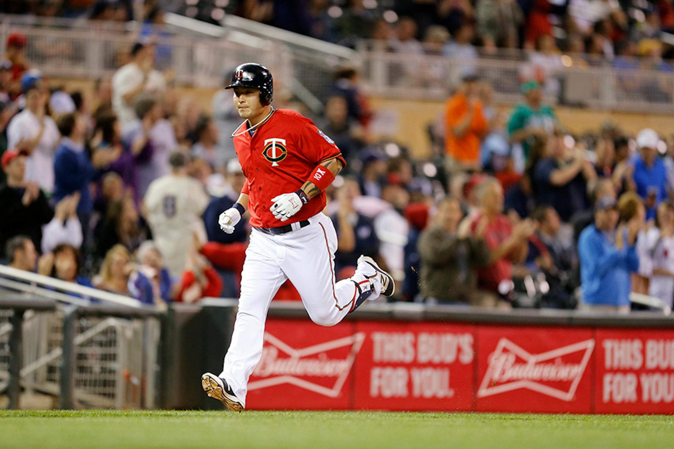 Minnesota Twins designated hitter Byung Ho Park (52) runs the bases after hitting a home run.