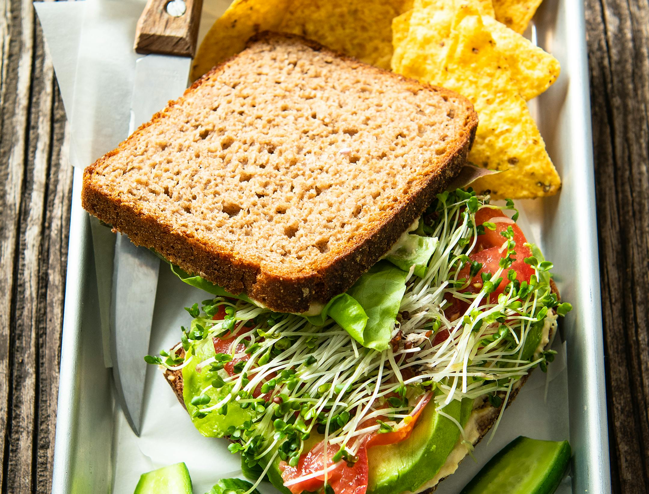 A lemon-garlicky hummus gives a welcome kick to California Avocado Toast served on multigrain bread.  Recipes by Beth Dooley, photo by Mette Nielsen, Special to the Star Tribune