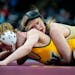 Northfield's Caley Graber (top) lost twice and won again Saturday, finishing fifth in her class in the boys bracket at the state meet.