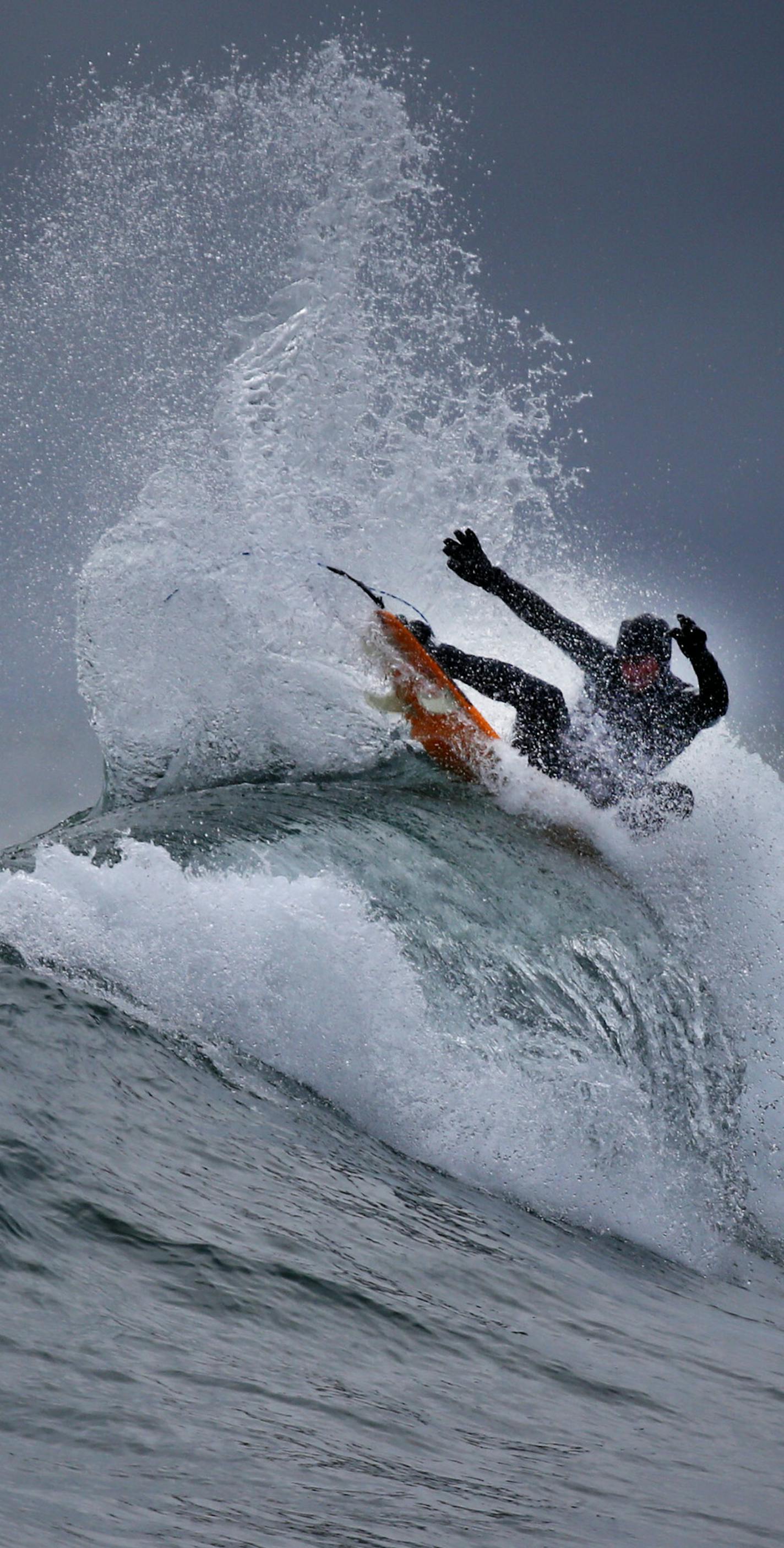 Pro surfer Alex Gray from California showed his stuff on the North Shore as Lake Superior churned out big waves Thursday, March 17, at Stony Point, near Two Harbors, MN. A passing front dropped some snow but also brought a stiff north wind, bringing waves nearing 10 feet and a small army of surfers.](DAVID JOLES/STARTRIBUNE)djoles@startribune.com A few years back, there were just a few men who dared surf Lake Superior. But this winter, after a winter storm, dozens of enthusiasts go out from Ston