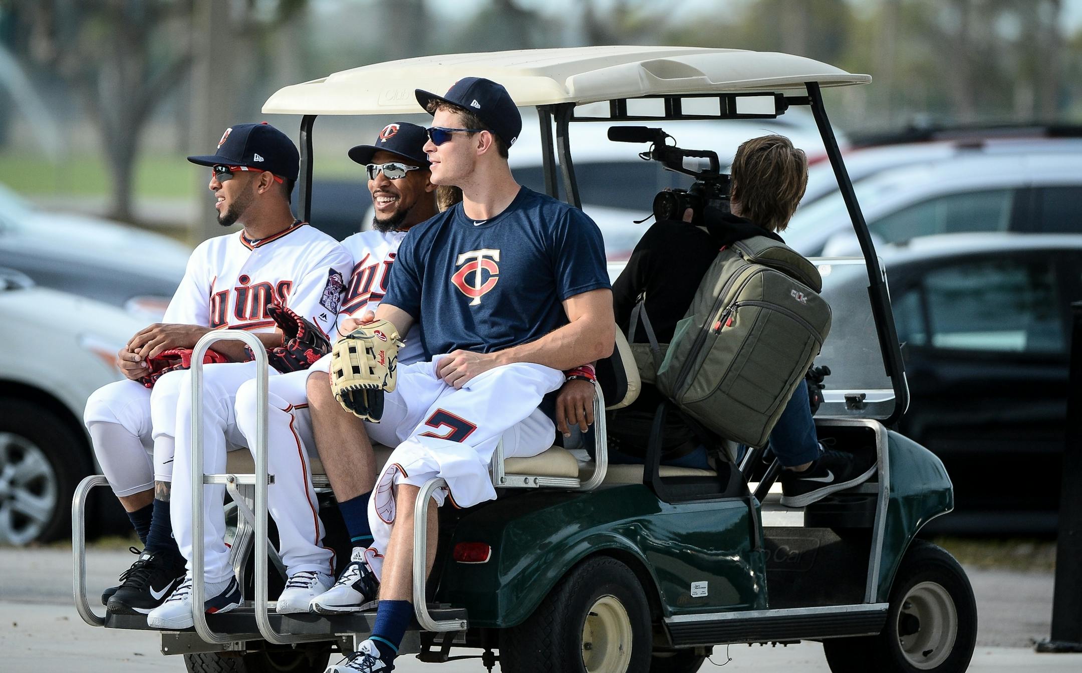 From left, Twins outfielders Eddie Rosario, Byron Buxton and Max Kepler were carted to a commercial shoot Saturday morning.
