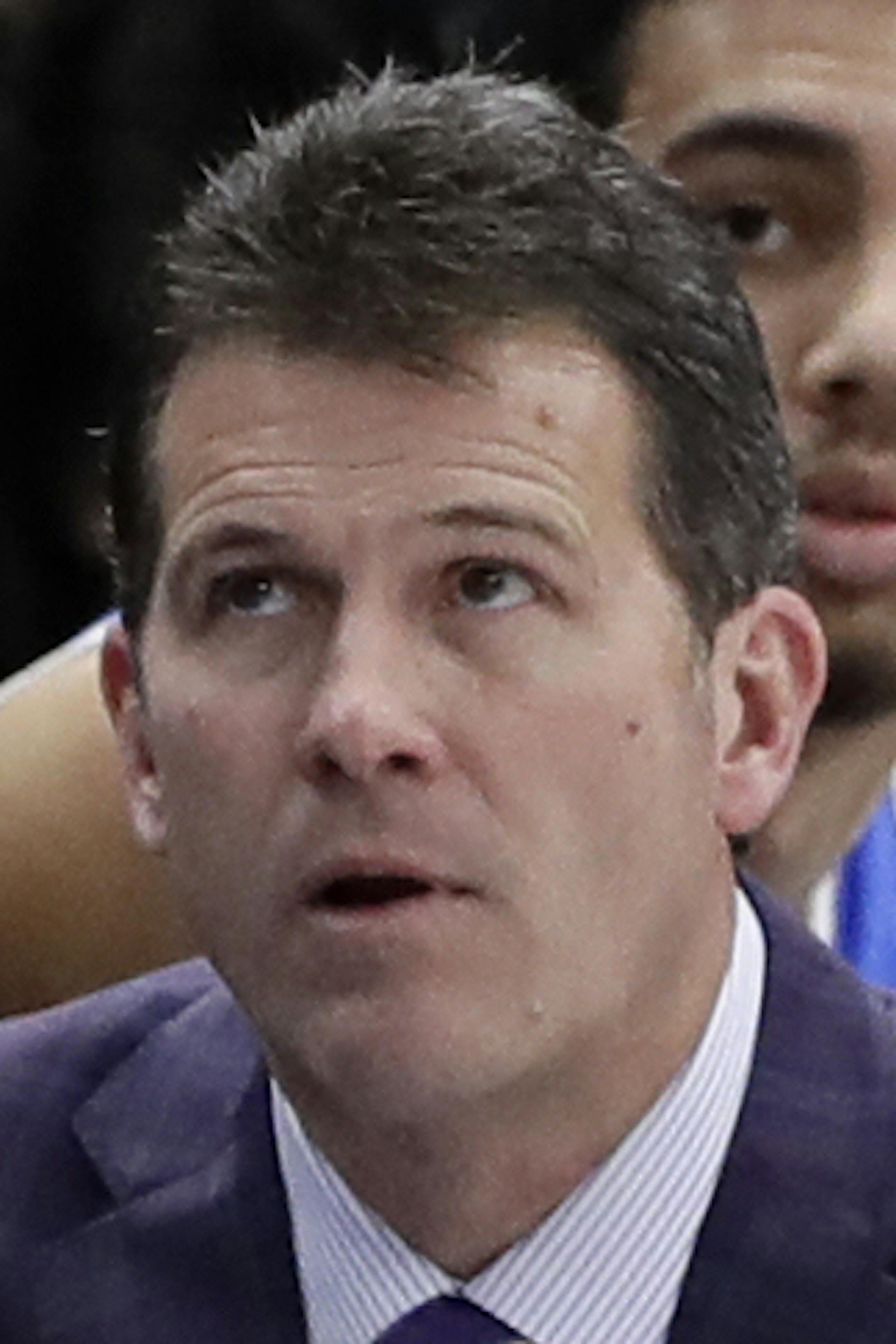File-This Dec. 22, 2018, file photo shows UCLA head coach Steve Alford and his players watching during the second half of an NCAA college basketball game against Ohio State, in the fifth annual CBS Sports Classic, in Chicago. Alford has been fired as UCLA basketball coach after six seasons, with the Bruins mired in a four-game skid that included losses at home to Belmont and Liberty. Athletic director Dan Guerrero said Monday, Dec. 31, 2018, that assistant Murry Bartow will serve as interim coac