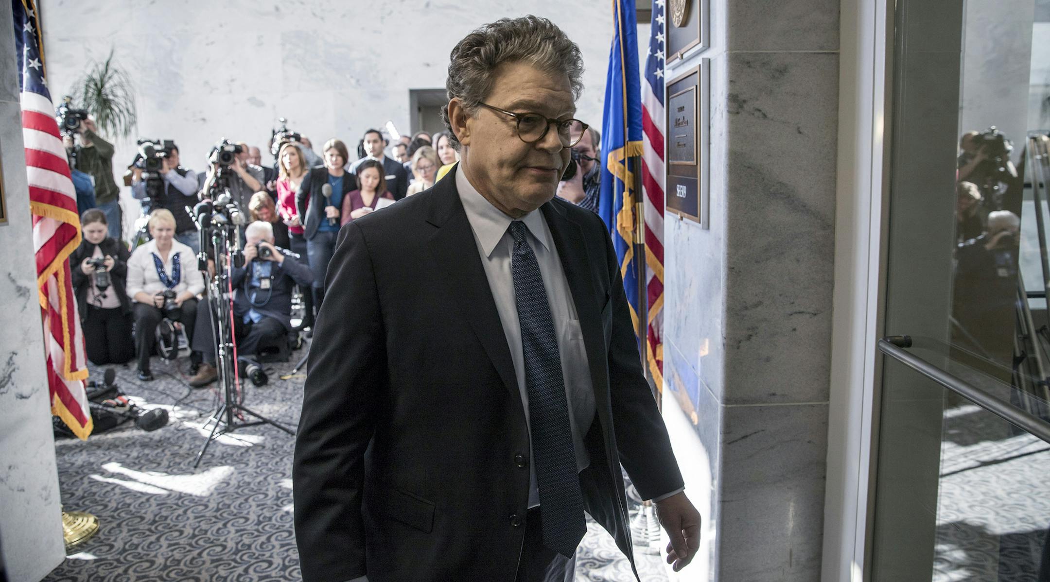 Sen. Al Franken, D-Minn., returns to his office after speaking to the media on Capitol Hill in Washington, Monday, Nov. 27, 2017. (AP Photo/J. Scott Applewhite) ORG XMIT: MIN2017112713075217