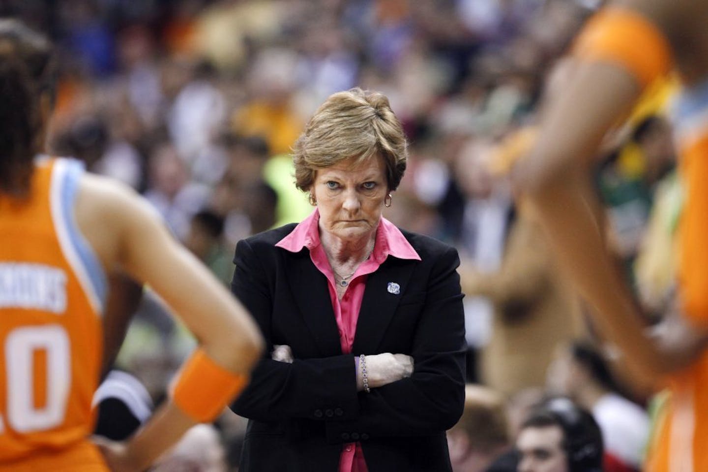 In this March 26, 2012, file photo, Tennessee coach Pat Summitt waits for her players during a timeout in the second half of an NCAA women's college basketball tournament regional final against Baylor in Des Moines, Iowa. Summitt, the winningest coach in Division I college basketball history who uplifted the women's game from obscurity to national prominence during her career at Tennessee, died Tuesday morning, June 28, 2016. She was 64.