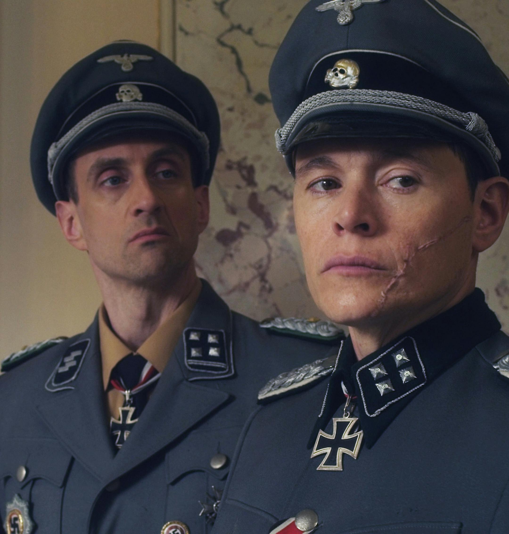 Charles Hubbell and Burn Gorman in "Walking With The Enemy"